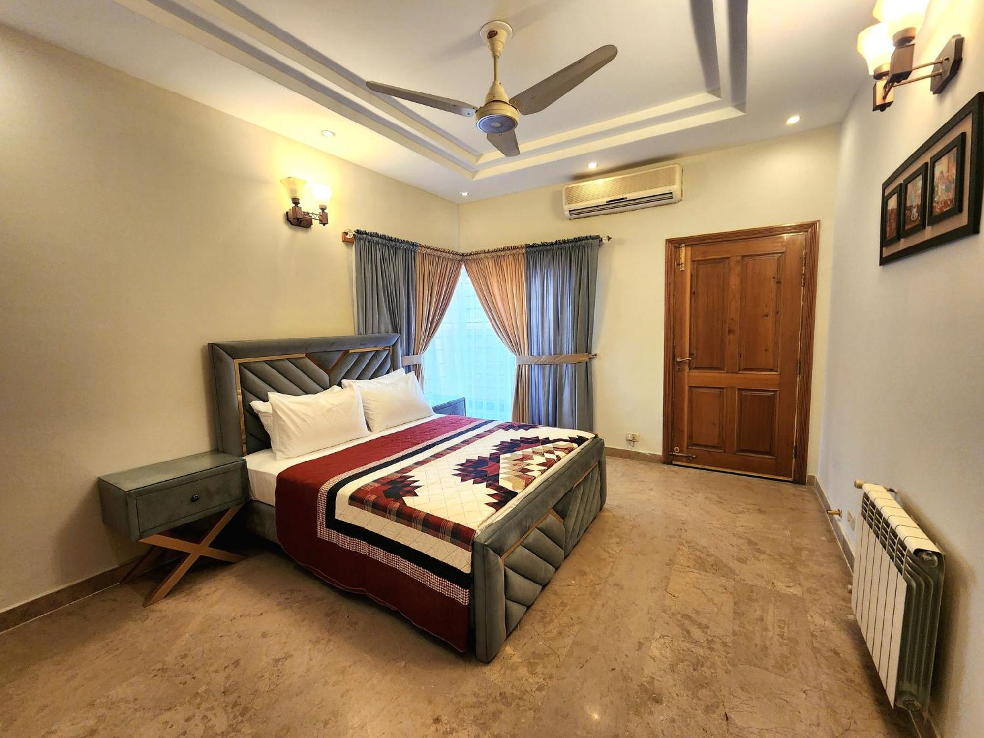 The Millenial Apartments & Suites Bahria Town Rawalpindi Rum bild