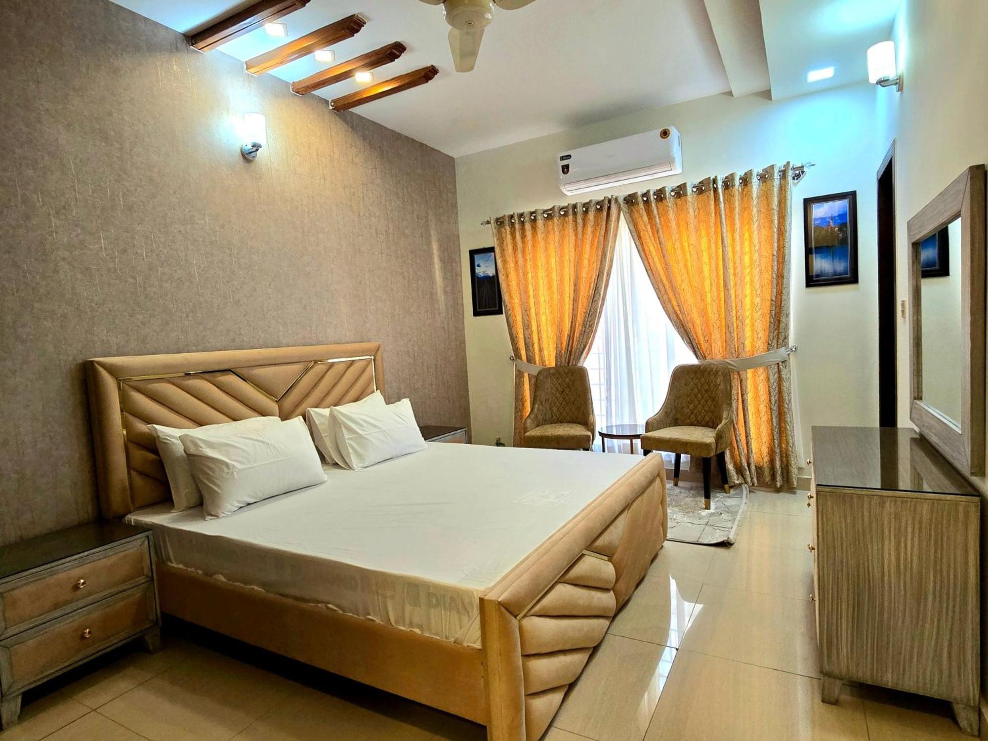 The Millenial Apartments & Suites Bahria Town Rawalpindi Rum bild