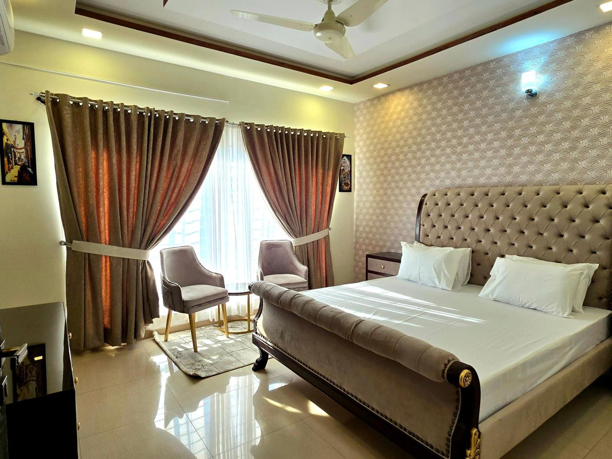 The Millenial Apartments & Suites Bahria Town Rawalpindi Rum bild