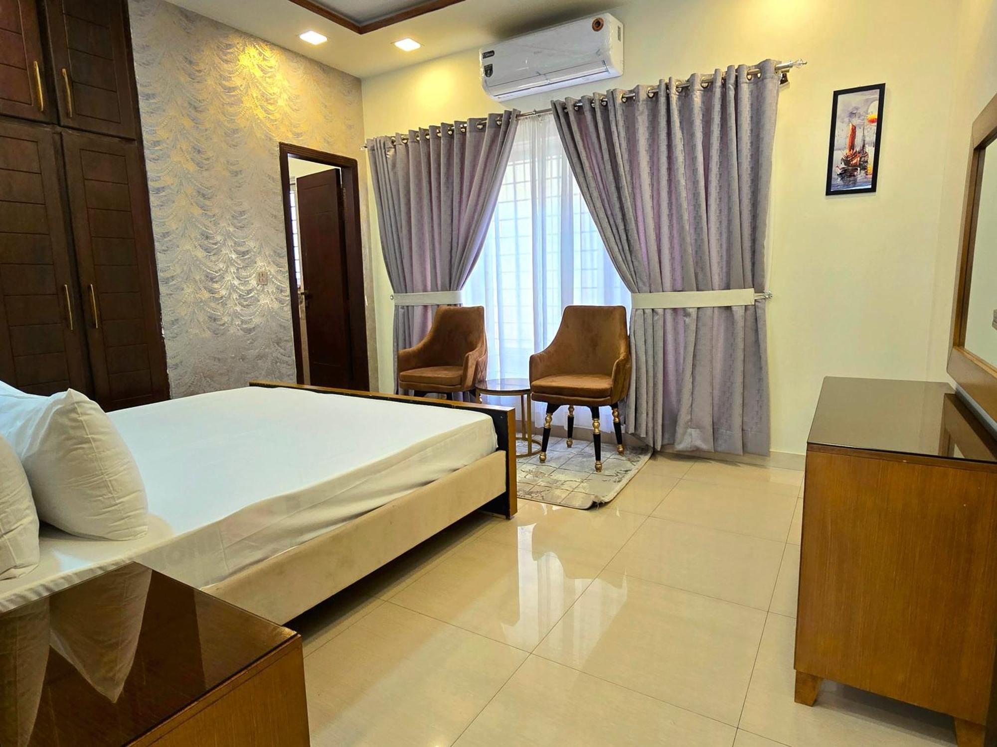 The Millenial Apartments & Suites Bahria Town Rawalpindi Rum bild